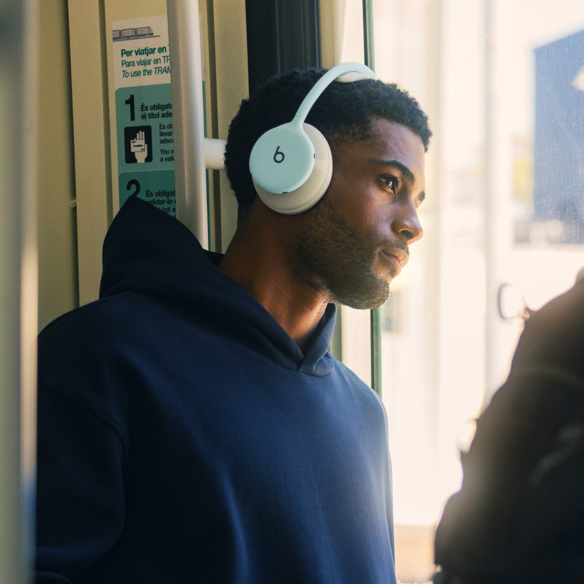 Person wearing Beats 360 headphones in Sky 